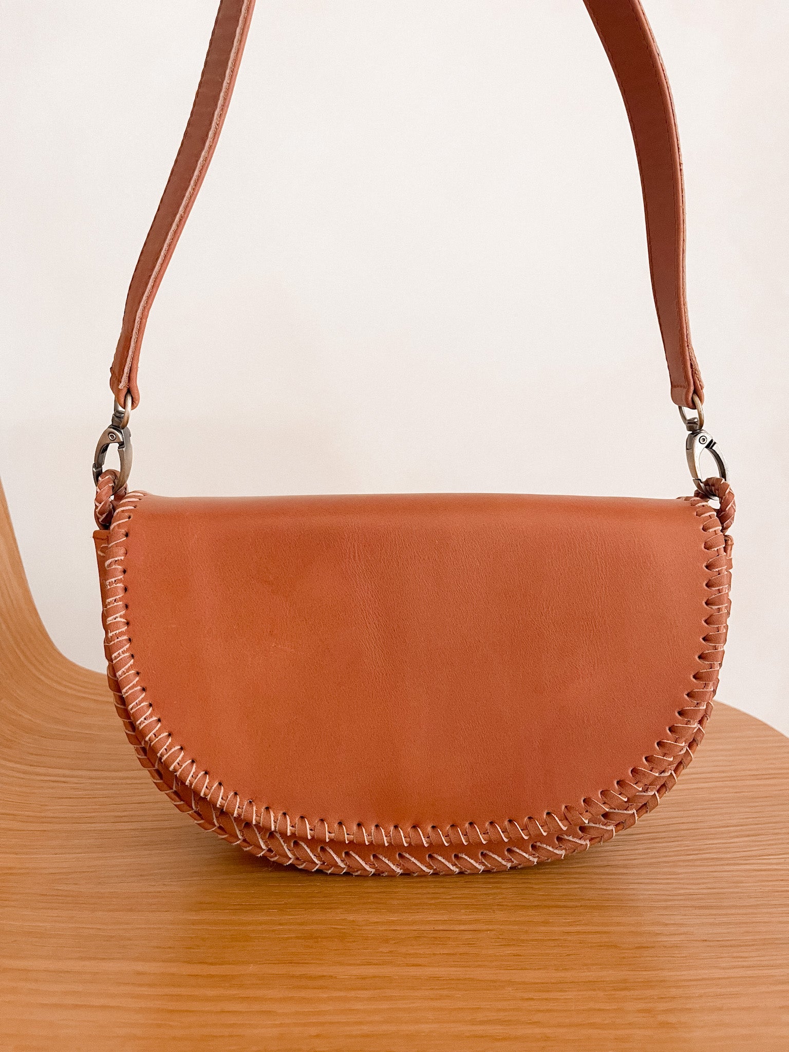 Brown leather crossbody saddle bag best sale